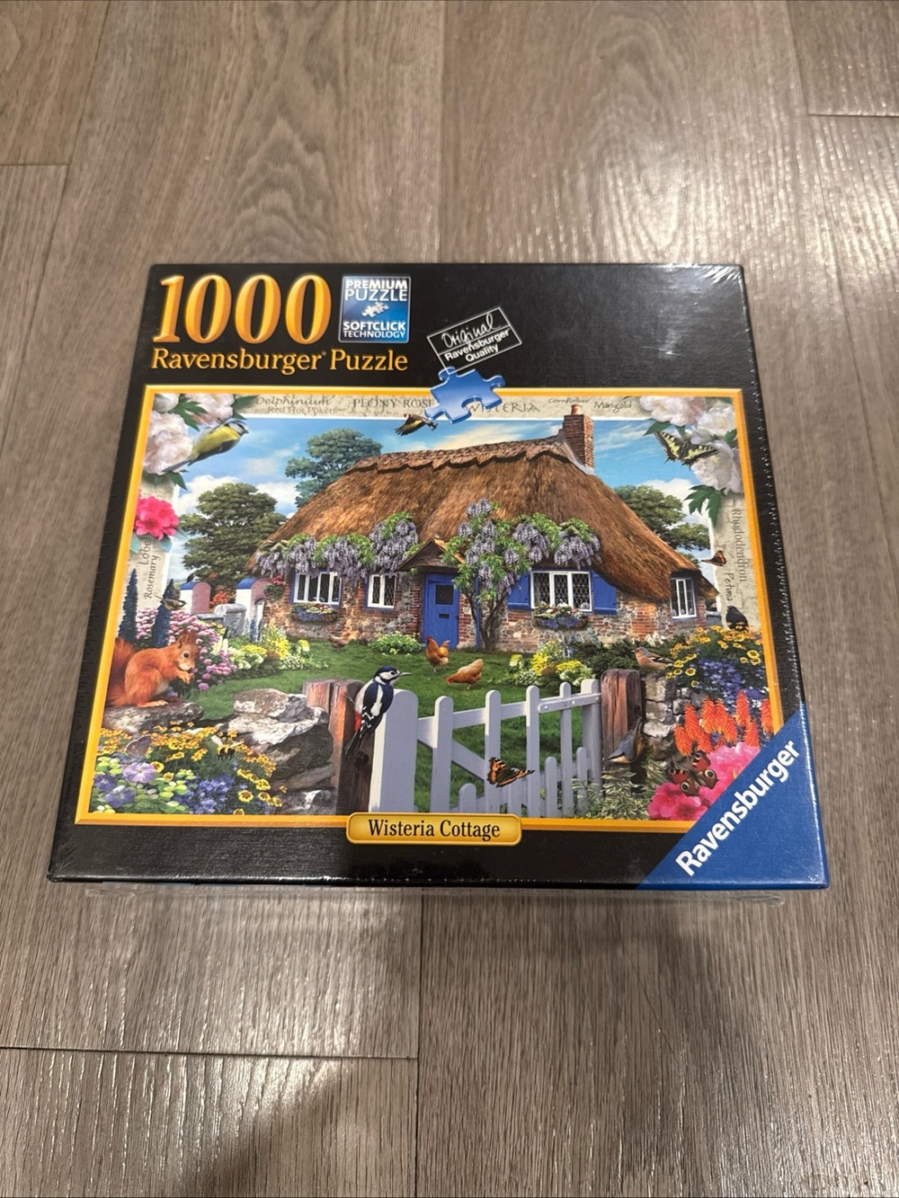 Sealed Ravensburger 1000-Piece Wisteria Cottage Puzzle - Blue Accent